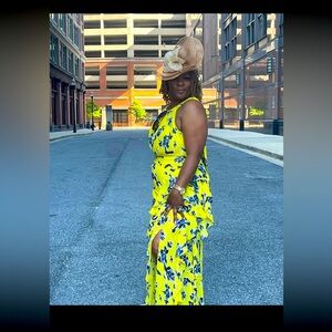 Yellow and blue floral maxi dress with tie back detail and ruffles. #floraldress